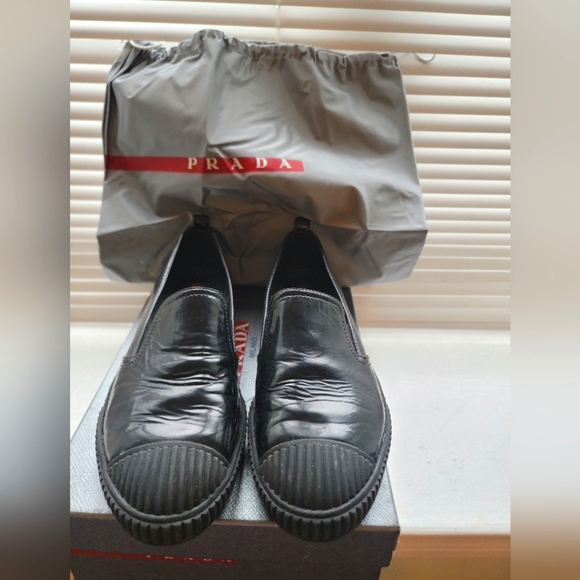 Gently loved Prada slip ons. Comes with dust bag and box. - Picture 3 of 4